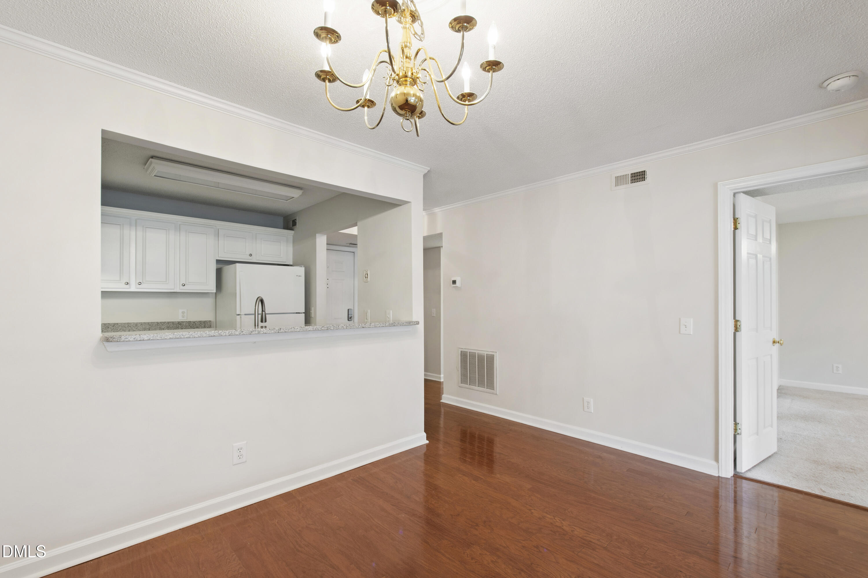 1210 Westview Lane, Unit 303 Raleigh, NC 27605 - Photo 6 of 27 a view of kitchen with wooden floor