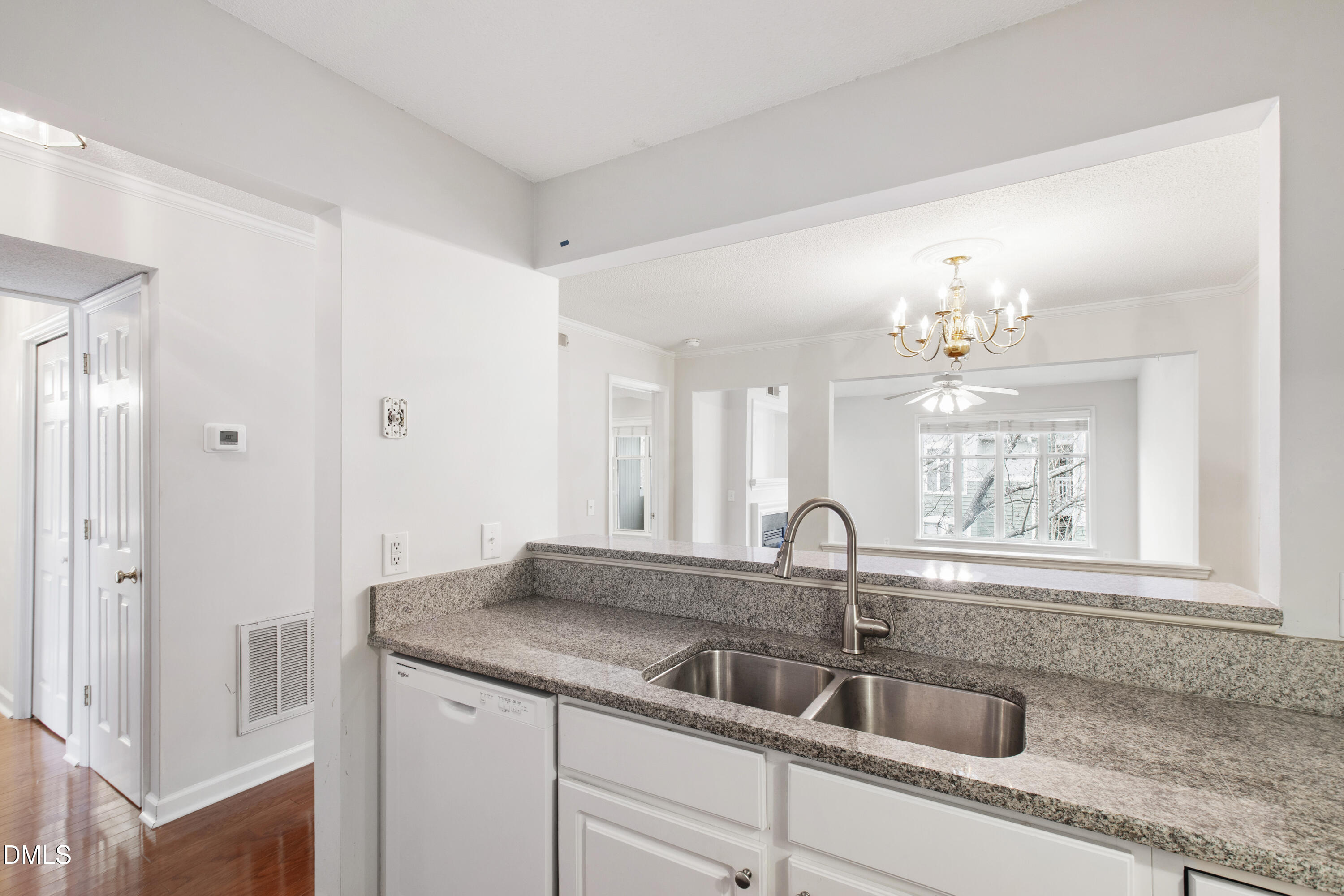 1210 Westview Lane, Unit 303 Raleigh, NC 27605 - Photo 8 of 27 a kitchen with a sink and cabinets