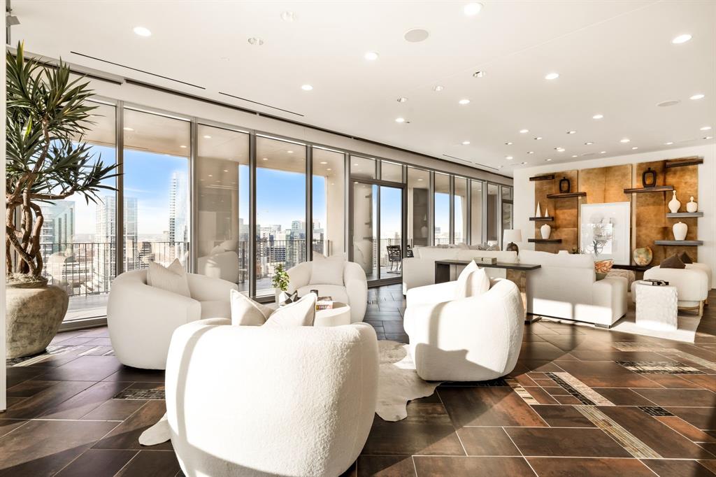 1717 Arts Plaza, Unit 2002 Dallas, TX 75201 - Photo 11 of 36 a living room with furniture and a large window