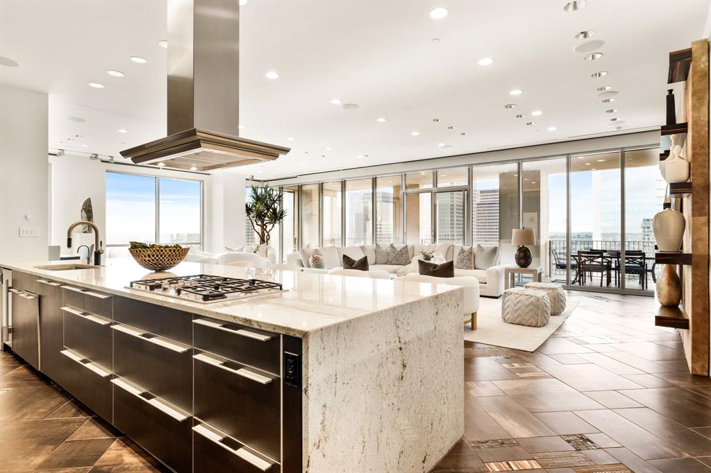 1717 Arts Plaza, Unit 2002 Dallas, TX 75201 - Photo 20 of 36 a large white kitchen with a large window
