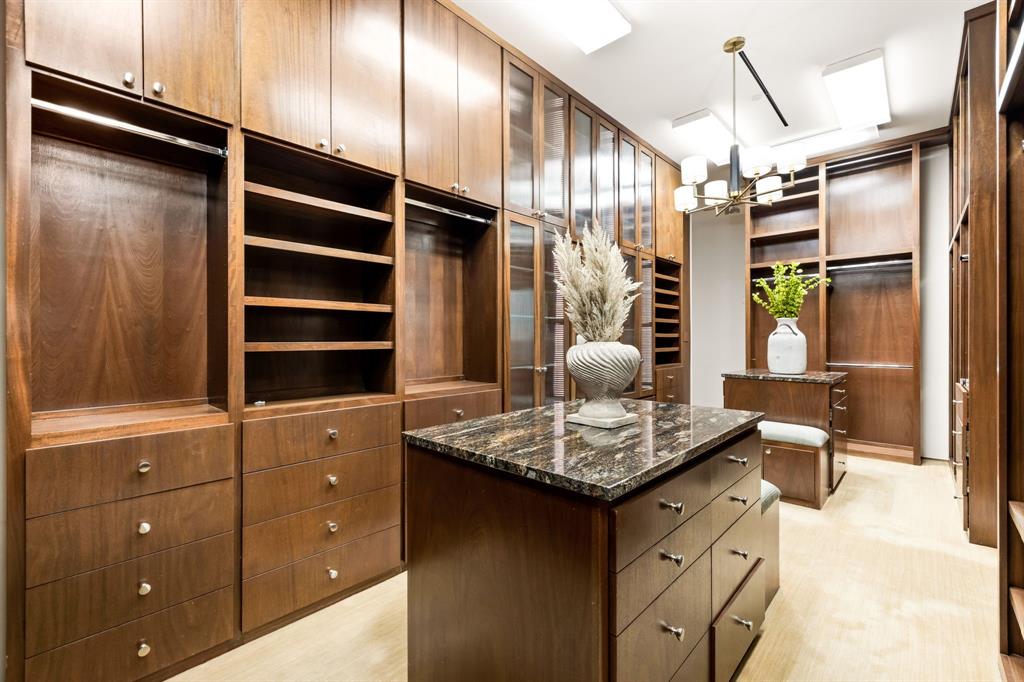 1717 Arts Plaza, Unit 2002 Dallas, TX 75201 - Photo 27 of 36 a view of kitchen island with cabinets