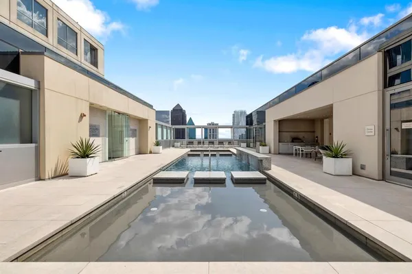 a picture of a bathroom with a shower