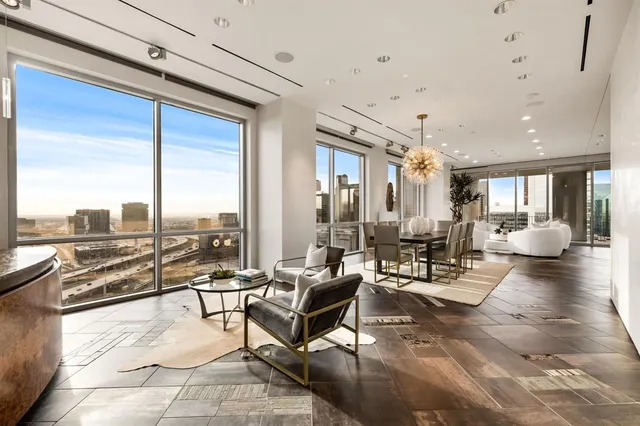 a living room with furniture and a table