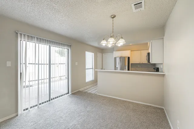 a view of a livingroom with a chandelier
