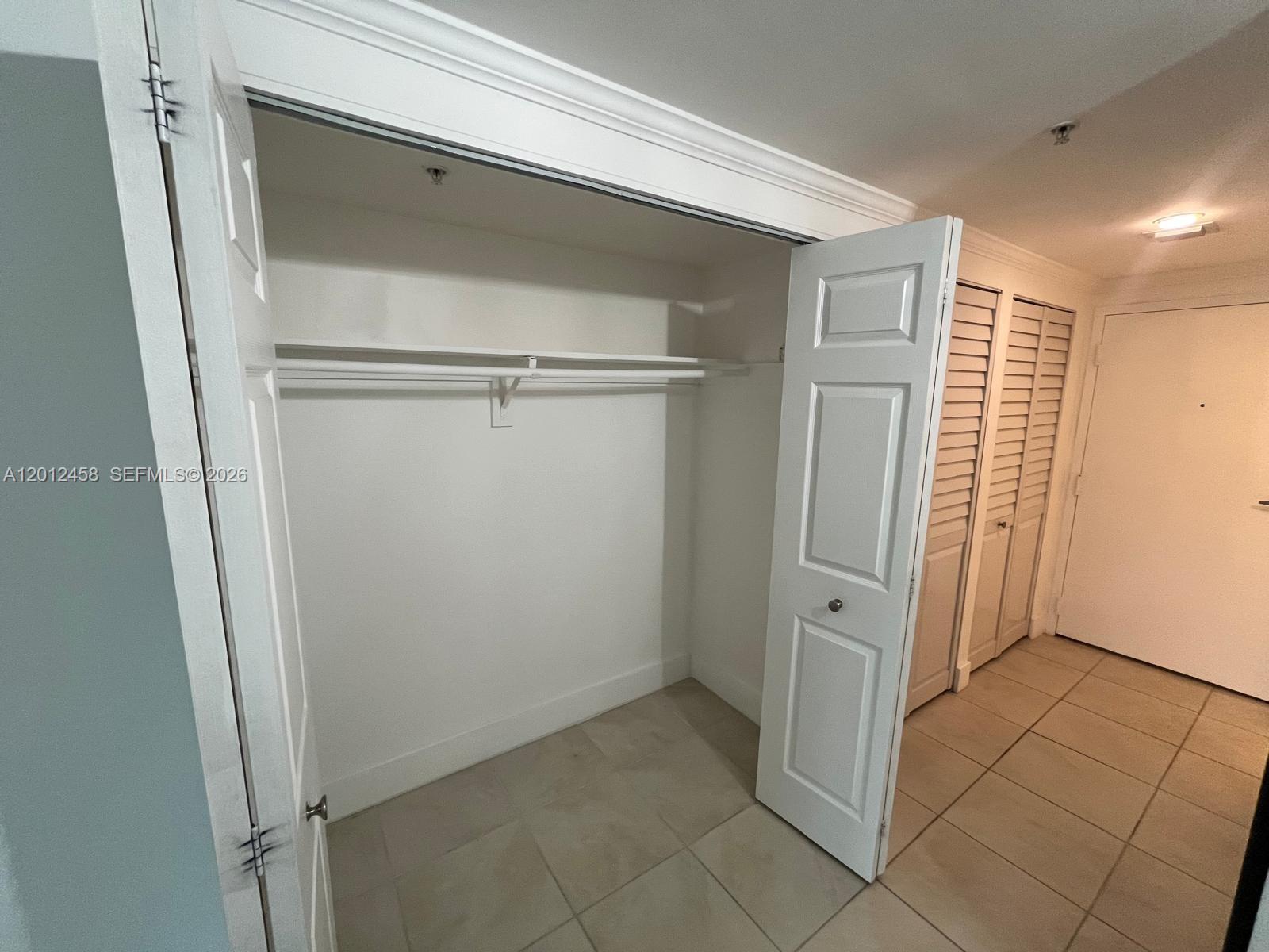 2740 Southwest 28th Terrace, Unit 203 Miami, FL 33133 - Photo 14 of 14 a view of closet area