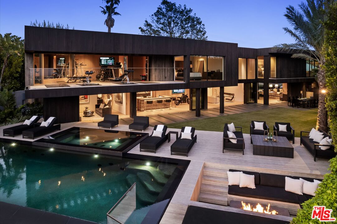 a view of house with a swimming pool