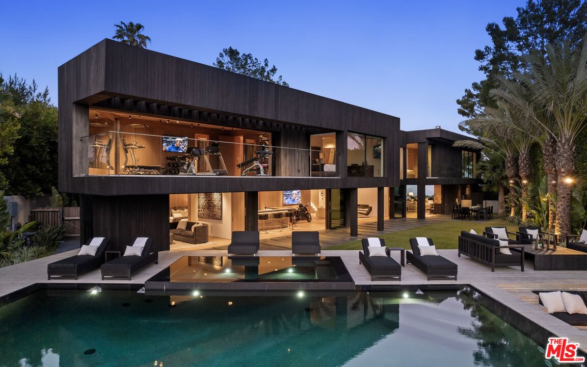 1663 Summitridge Drive Beverly Hills, CA 90210 - Photo 18 of 41 a view of pool with outdoor seating