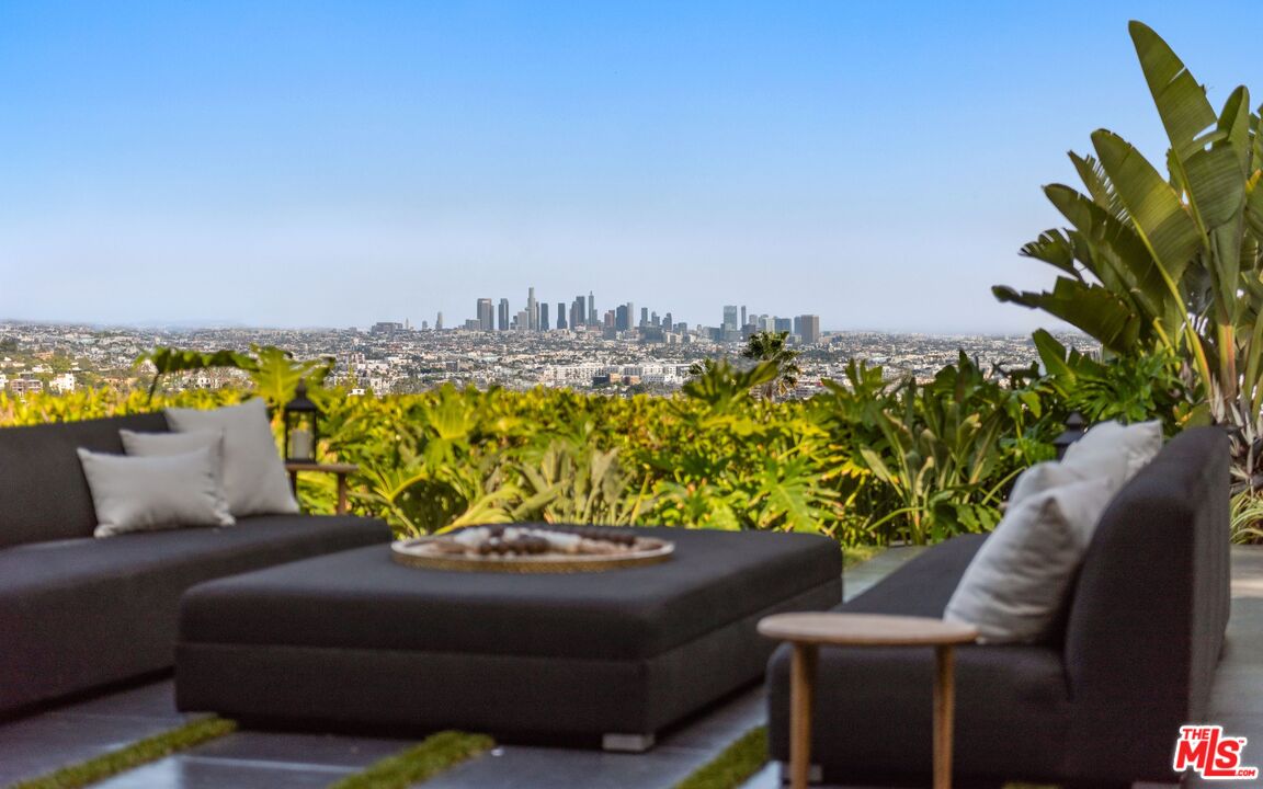 1663 Summitridge Drive Beverly Hills, CA 90210 - Photo 41 of 41 a view of a chairs in a terrace