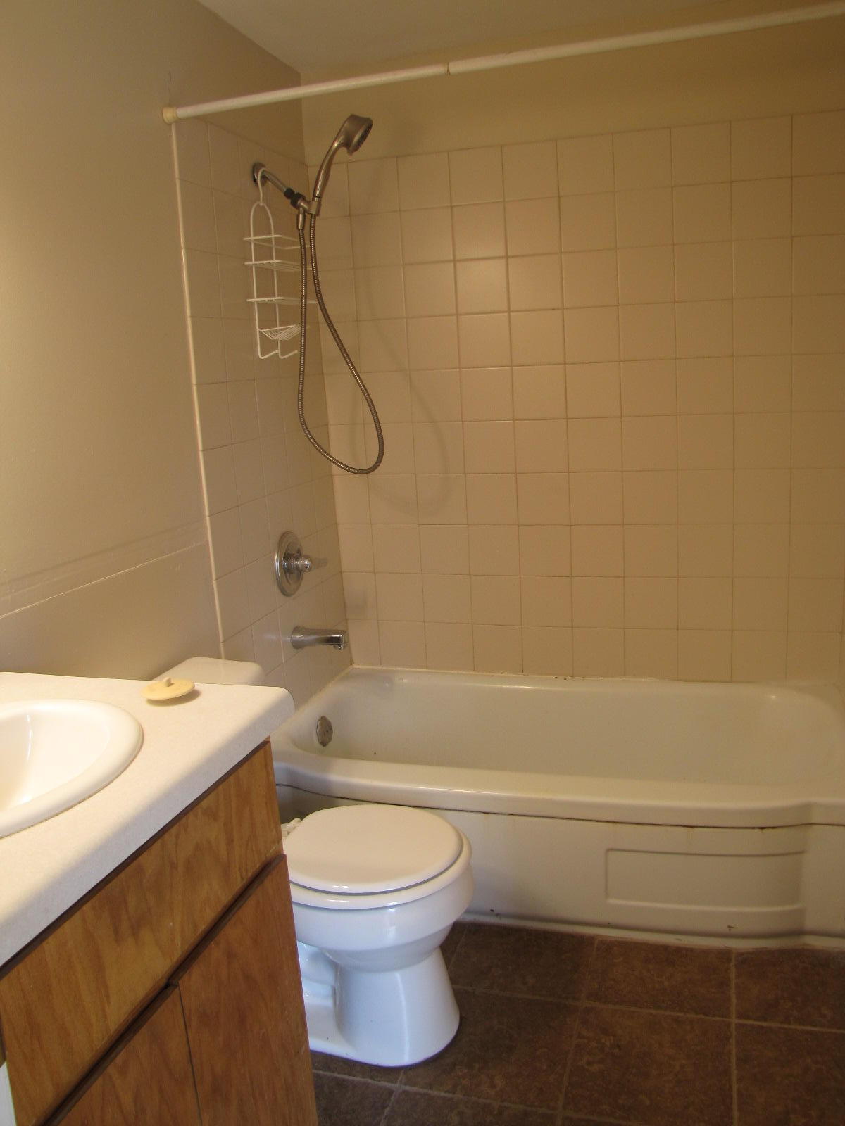 451 East 3rd Avenue Crestview, FL 32536 - Photo 8 of 8 a bathroom with a sink a toilet and shower