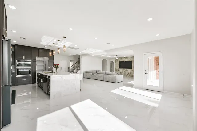 a bathroom with a double vanity sink and a mirror