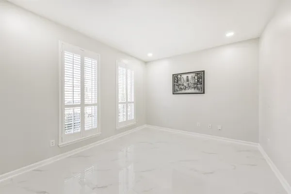 an empty room with windows