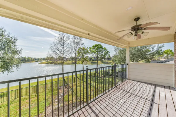 a view of a balcony with furniture