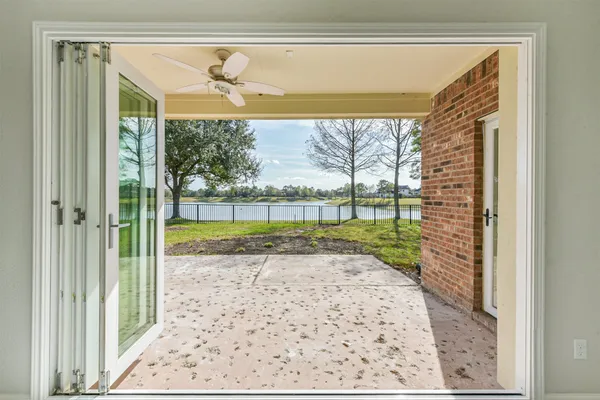 a view of a porch and a yard