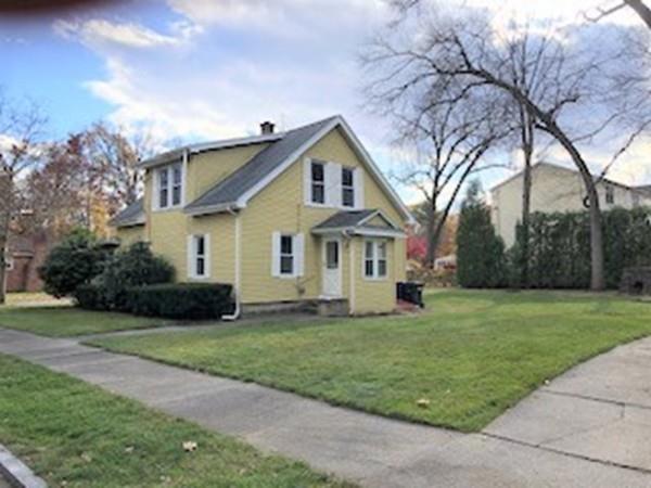 42 Carroll Street Springfield, MA 01108 - Photo 16 of 16 a front view of a house with a yard and trees