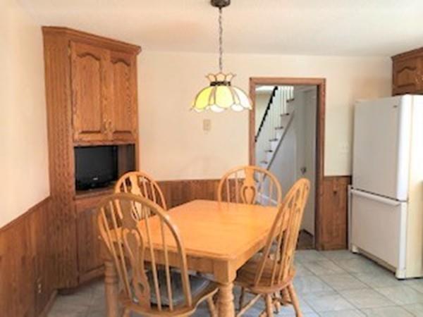 42 Carroll Street Springfield, MA 01108 - Photo 2 of 16 a view of a dining room with furniture