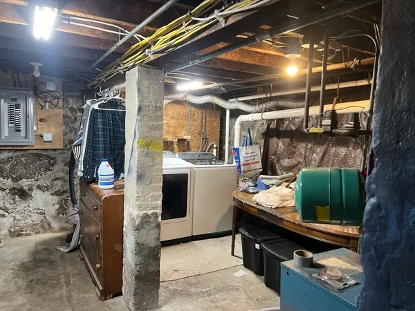 a utility room with washer and dryer