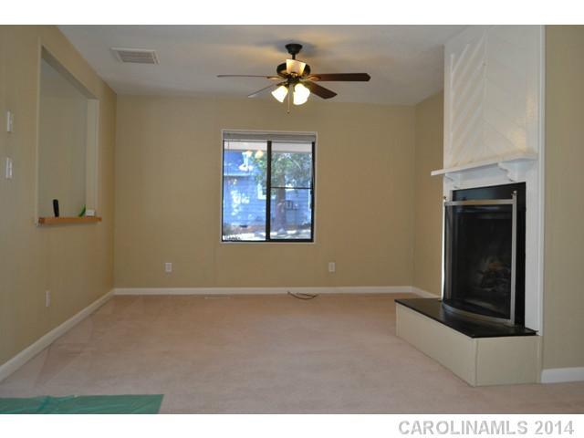 4077 Point Clear Drive Tega Cay, SC 29708 - Photo 3 of 14 a view of an empty room with a window