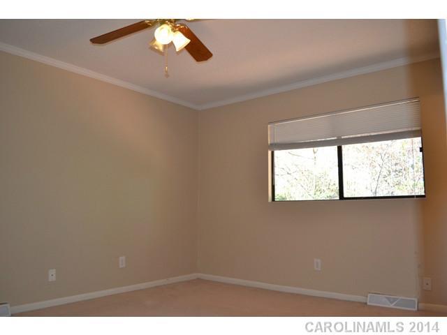 4077 Point Clear Drive Tega Cay, SC 29708 - Photo 6 of 14 a view of an empty room with a window