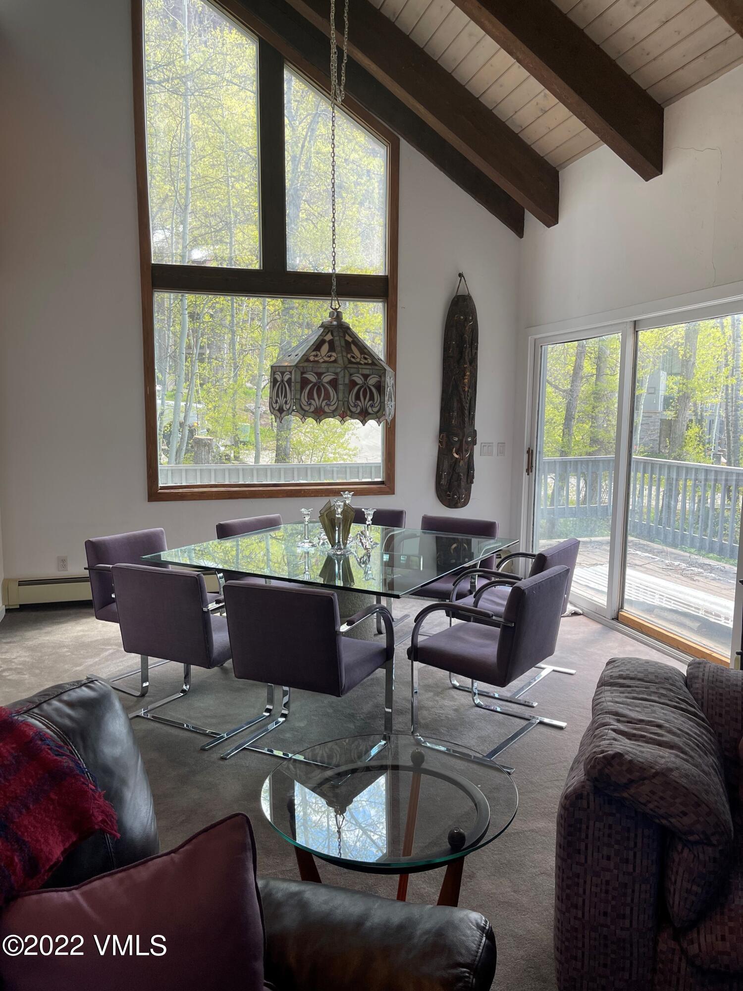3031 Booth Falls Road Vail, CO 81657 - Photo 14 of 14 a living room with furniture and a large window