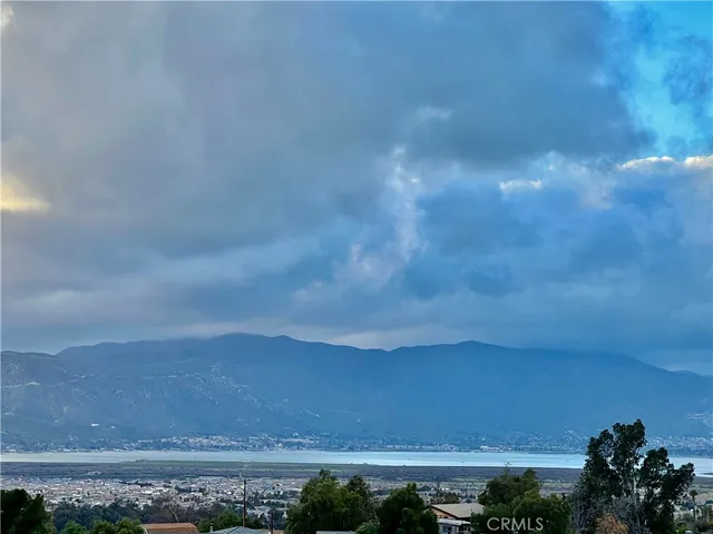 an aerial view of residential building and trees