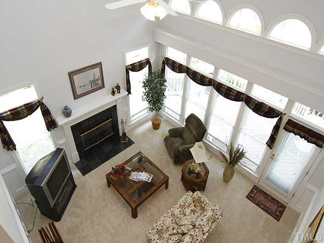 2964 Tillinghast Trail Raleigh, NC 27613 - Photo 11 of 23 View of the famliy room from the upstairs hallway. Notice all the light! Den/Family/Great Room