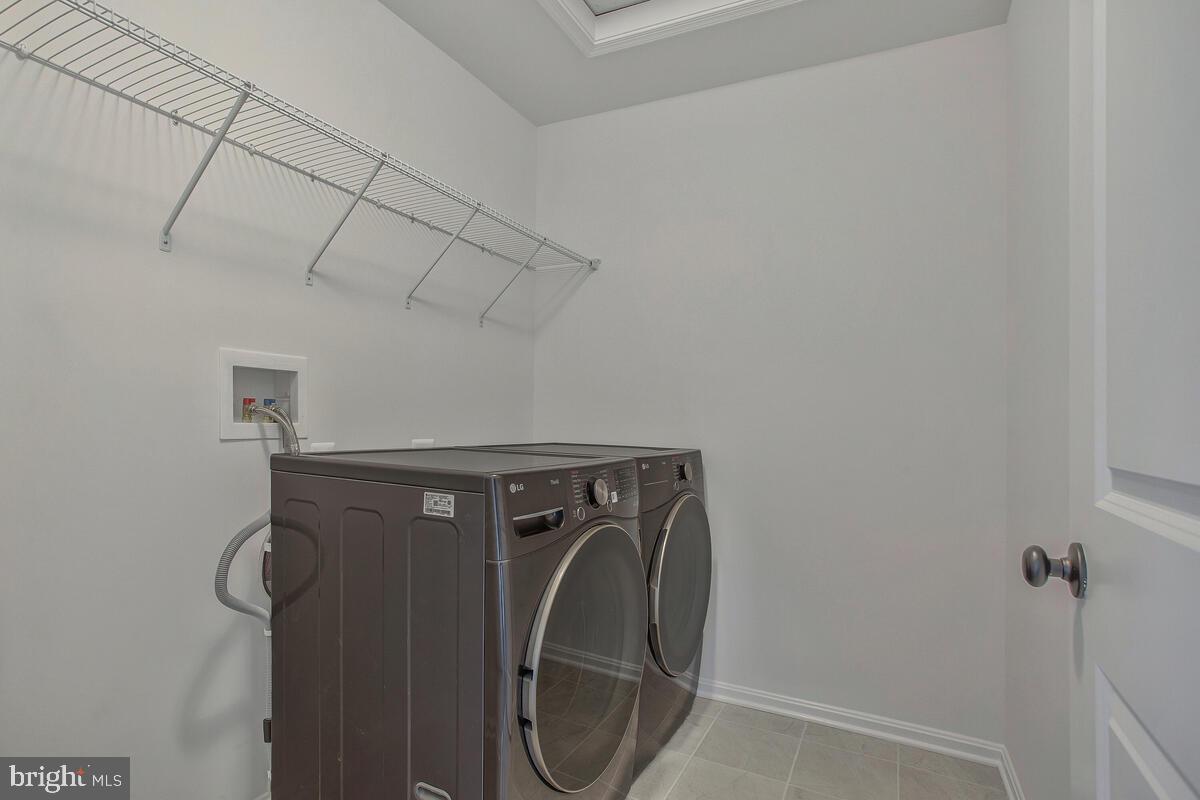 6519 Suitland Road Suitland, MD 20746 - Photo 16 of 18 a utility room with dryer and washer
