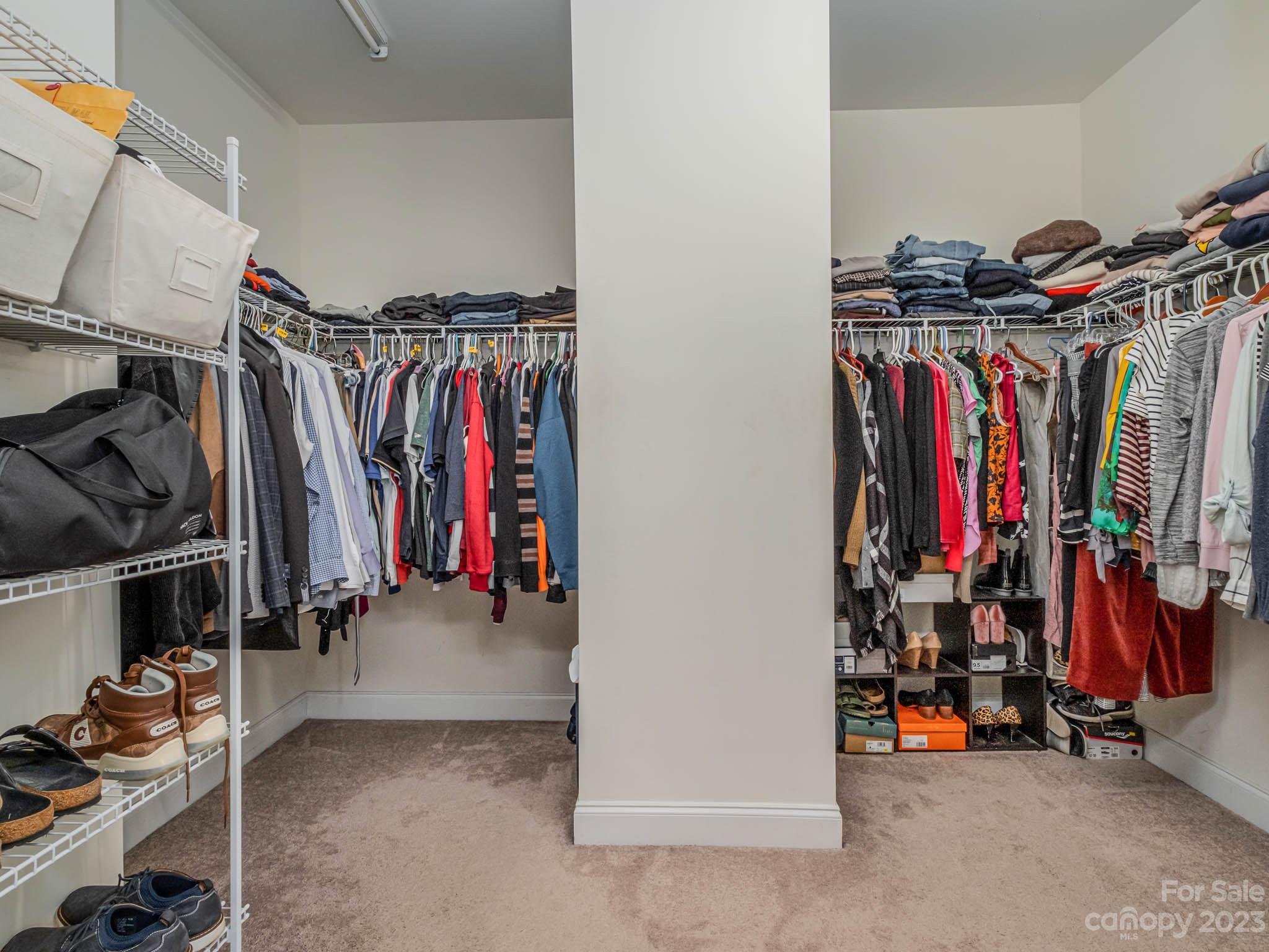 79432 Ridgehaven Road Lancaster, SC 29720 - Photo 26 of 42 a view of walk in closet with clothes and shoes