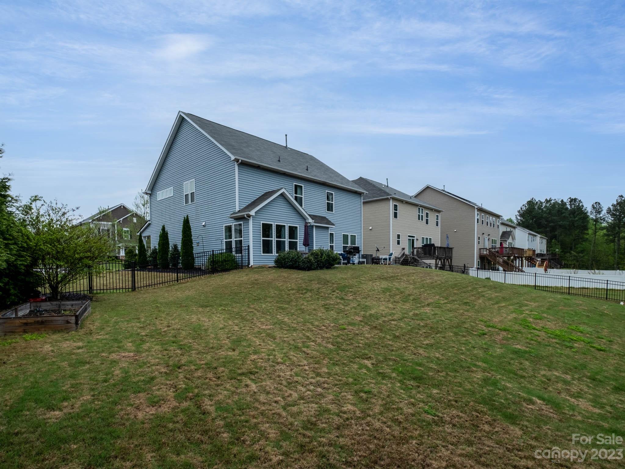 79432 Ridgehaven Road Lancaster, SC 29720 - Photo 35 of 42 a view of a house with a big yard and large trees