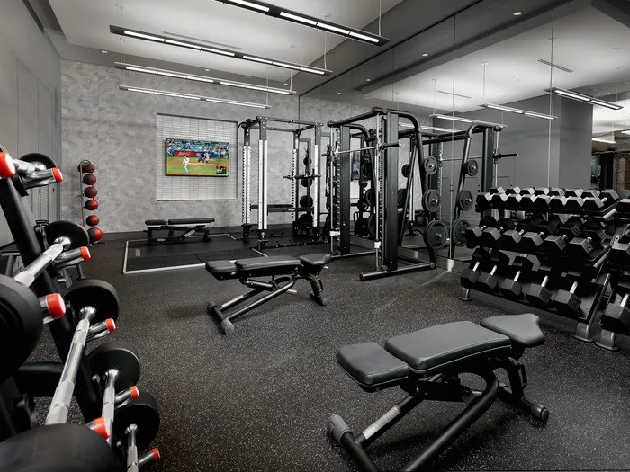 2651 Kipling Street, Unit 4004 Houston, TX 77098 - Photo 6 of 9 a view of a room with gym equipment