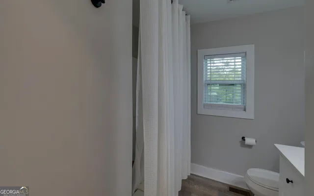 a bathroom with a toilet