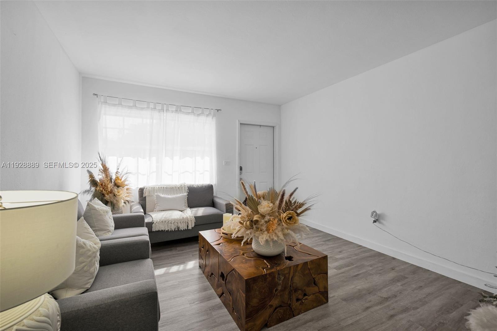 3711 Southwest 27th Terrace Miami, FL 33134 - Photo 14 of 62 a living room with furniture and a potted plant