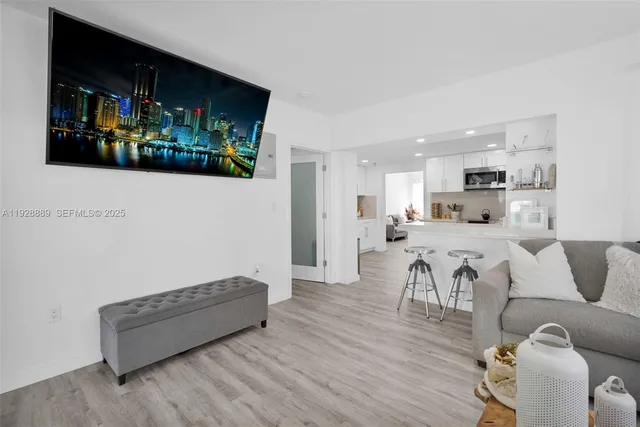 a view of a chairs and table in backyard of the house