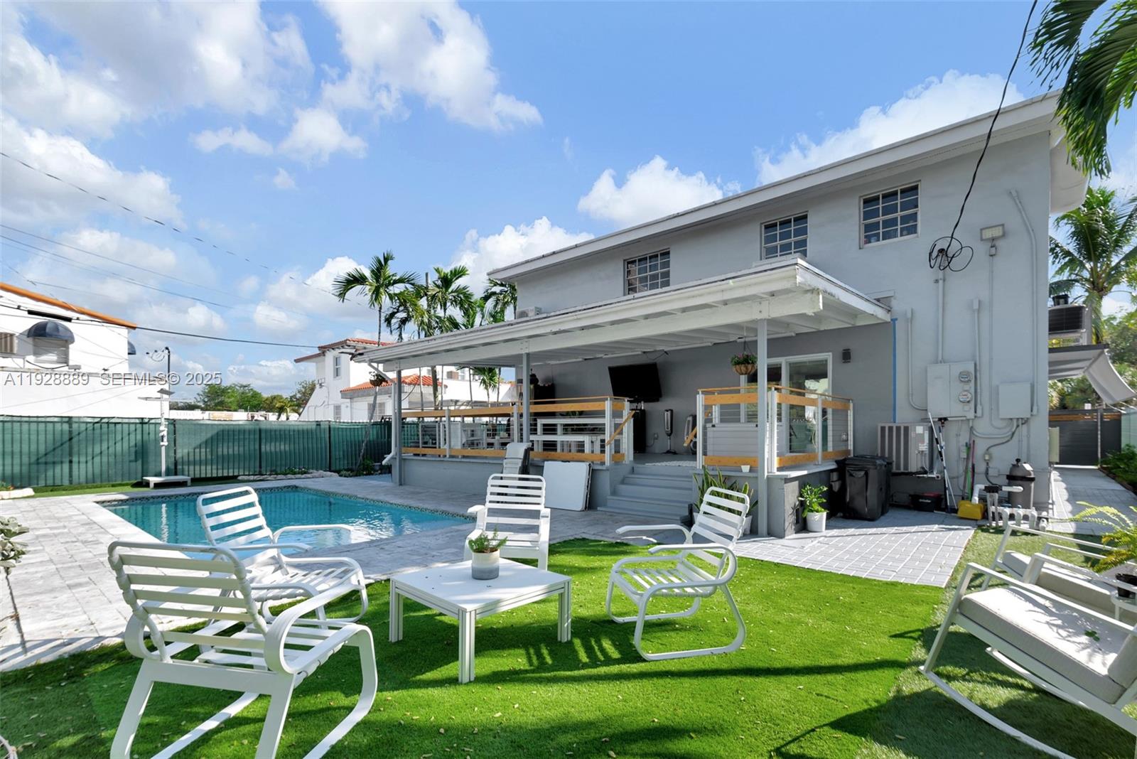 3711 Southwest 27th Terrace Miami, FL 33134 - Photo 42 of 62 a view of a house with backyard porch and patio