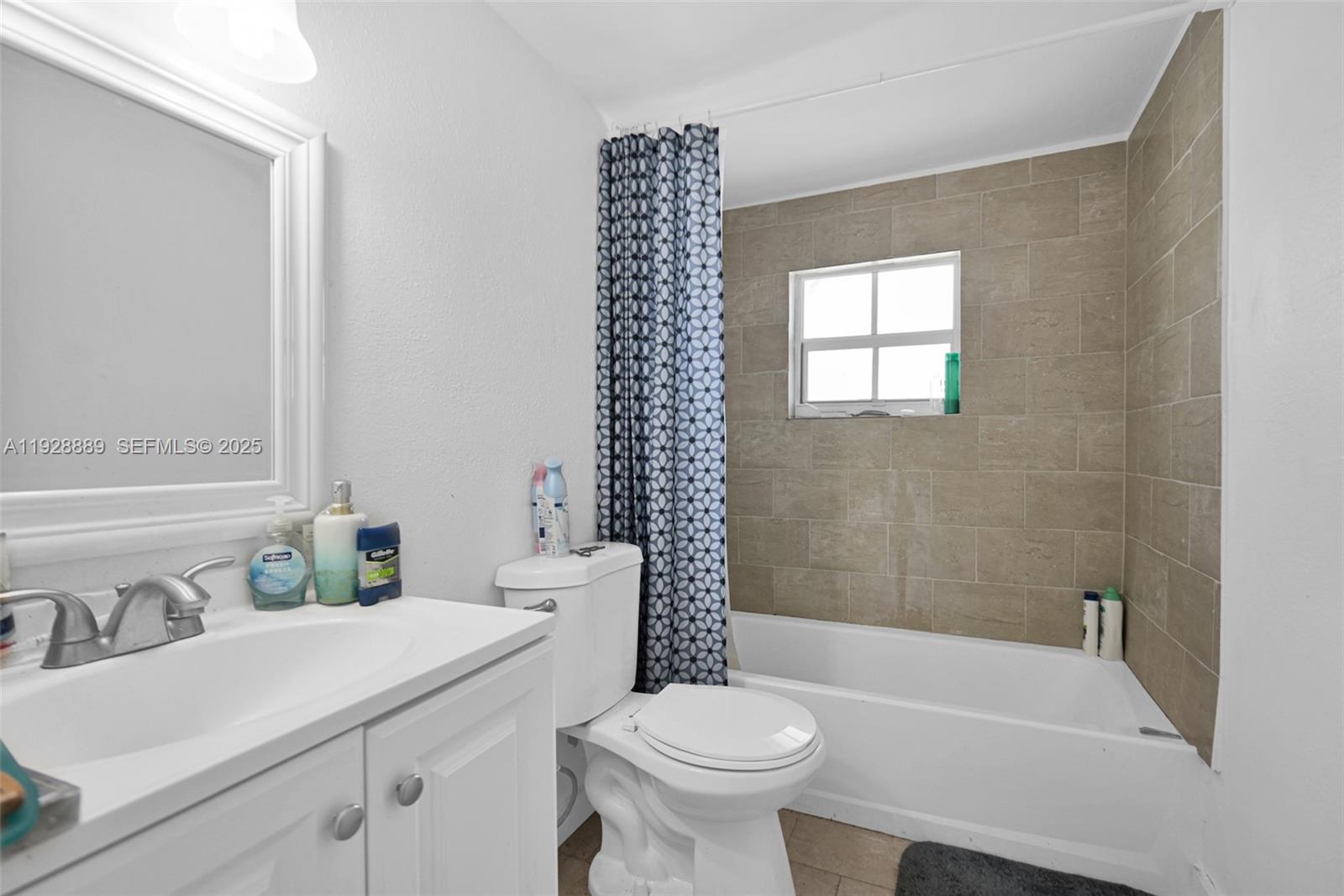 3711 Southwest 27th Terrace Miami, FL 33134 - Photo 46 of 62 a bathroom with a sink toilet and shower