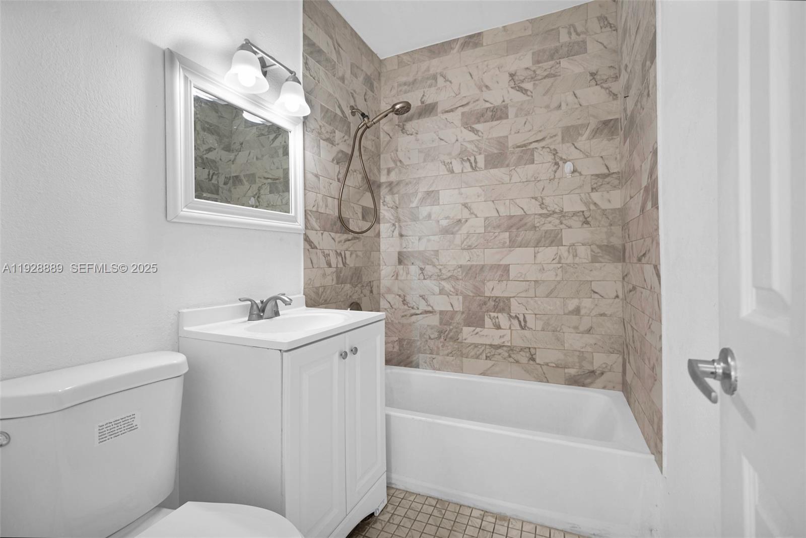 3711 Southwest 27th Terrace Miami, FL 33134 - Photo 53 of 62 a bathroom with a sink toilet and shower