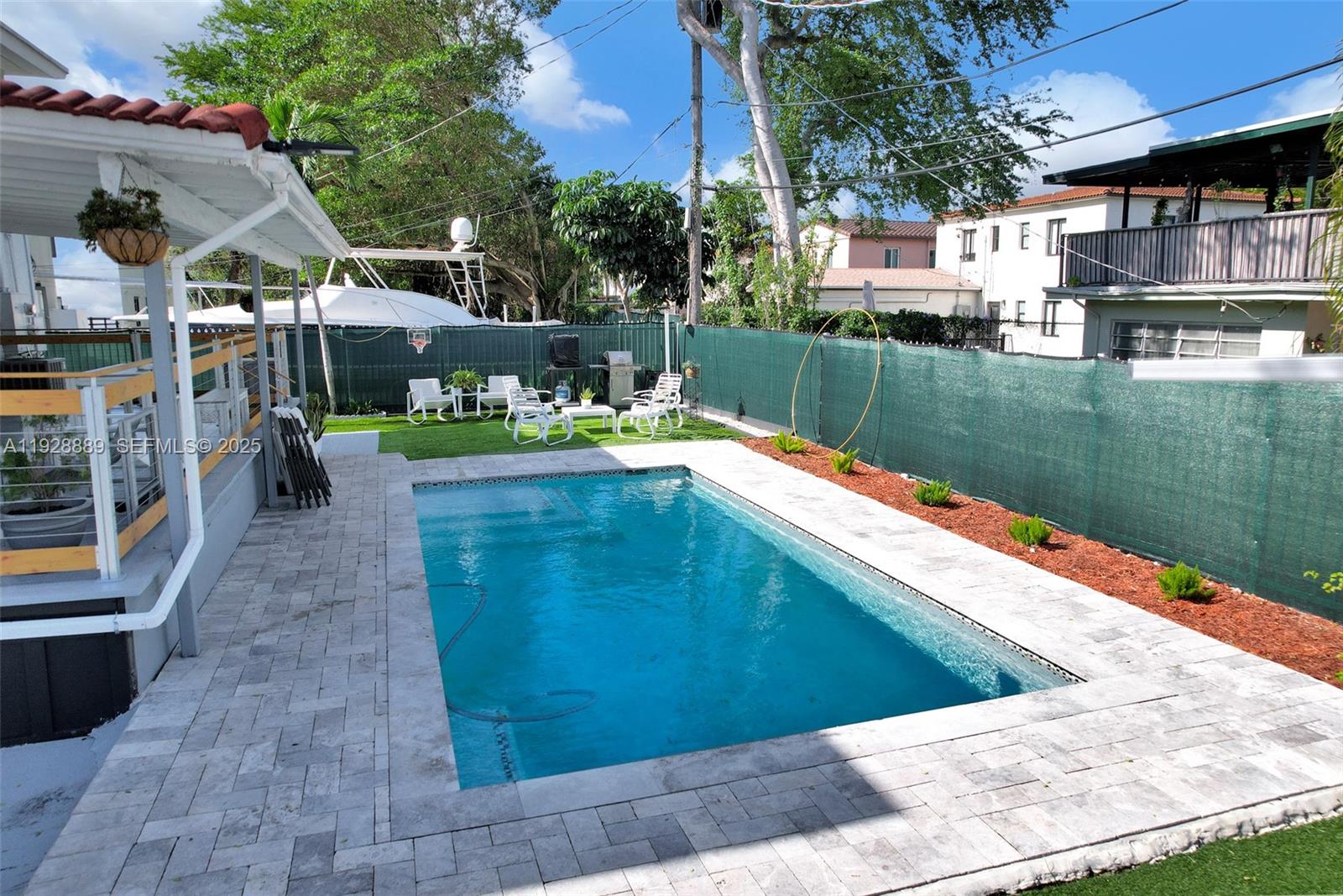 3711 Southwest 27th Terrace Miami, FL 33134 - Photo 7 of 62 a view of swimming pool with a patio