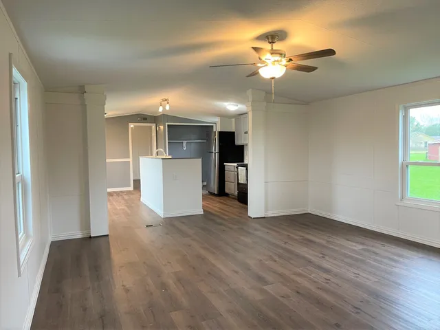 a view of a kitchen with a dishwasher cabinets and a kitchen