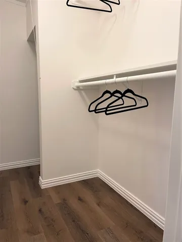 a view of room with hardwood floor