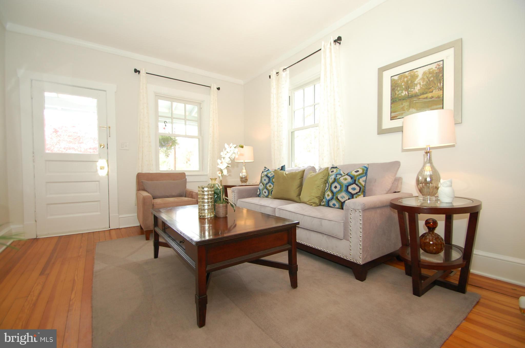 2104 Hanover Street Silver Spring, MD 20910 - Photo 4 of 22 a living room with furniture and a window