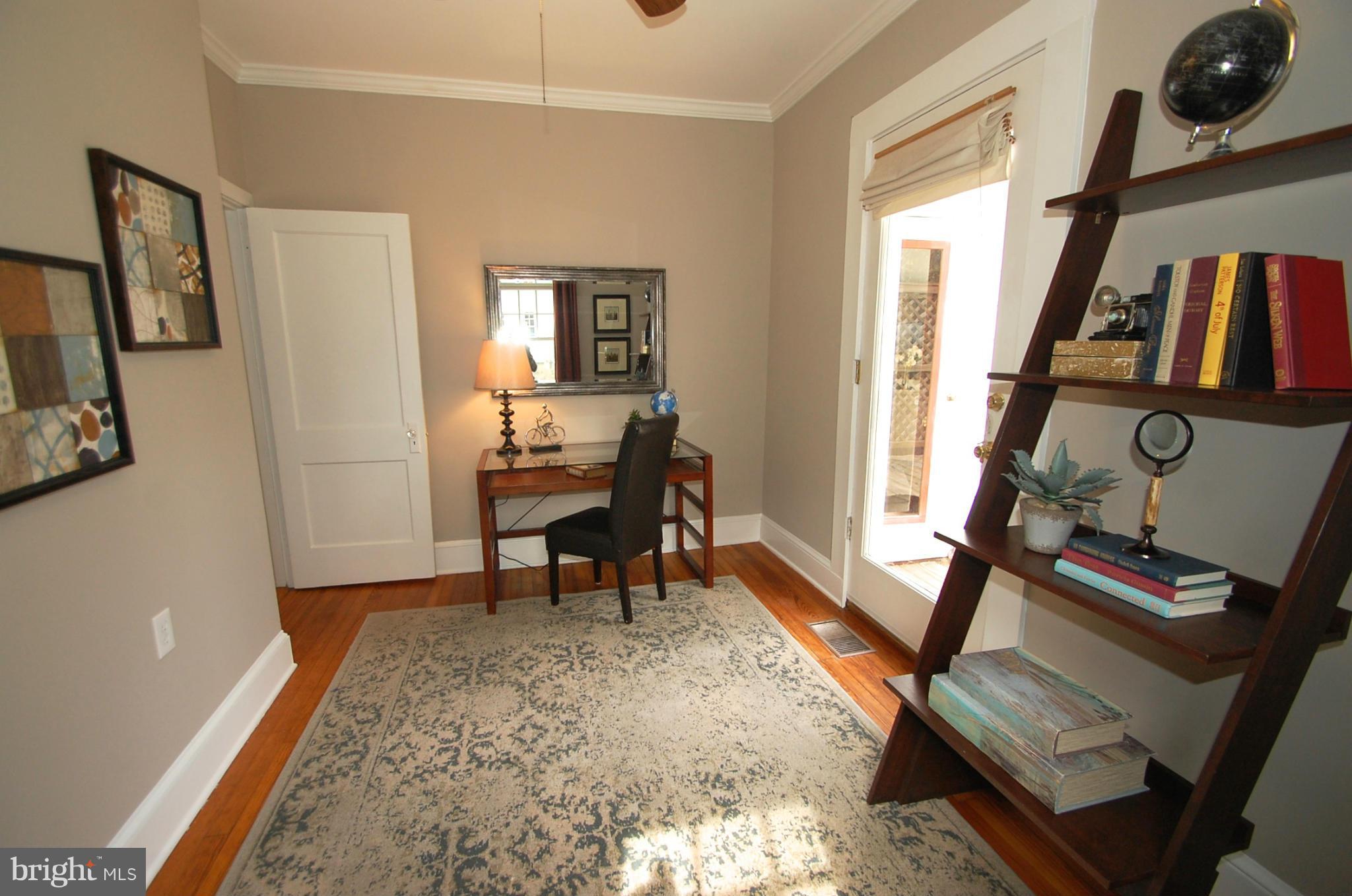 2104 Hanover Street Silver Spring, MD 20910 - Photo 10 of 22 a living room with furniture and a window