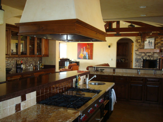 4770 Santa Ana Valley Road Hollister, CA 95023 - Photo 12 of 17 a kitchen with stainless steel appliances granite countertop a stove a sink and a microwave