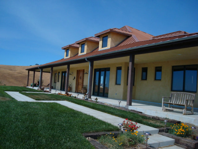4770 Santa Ana Valley Road Hollister, CA 95023 - Photo 4 of 17 a front view of a house with a yard table and chairs