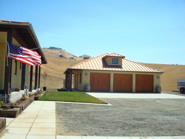 4770 Santa Ana Valley Road Hollister, CA 95023 - Photo 6 of 17 a front view of a house with a yard and garage