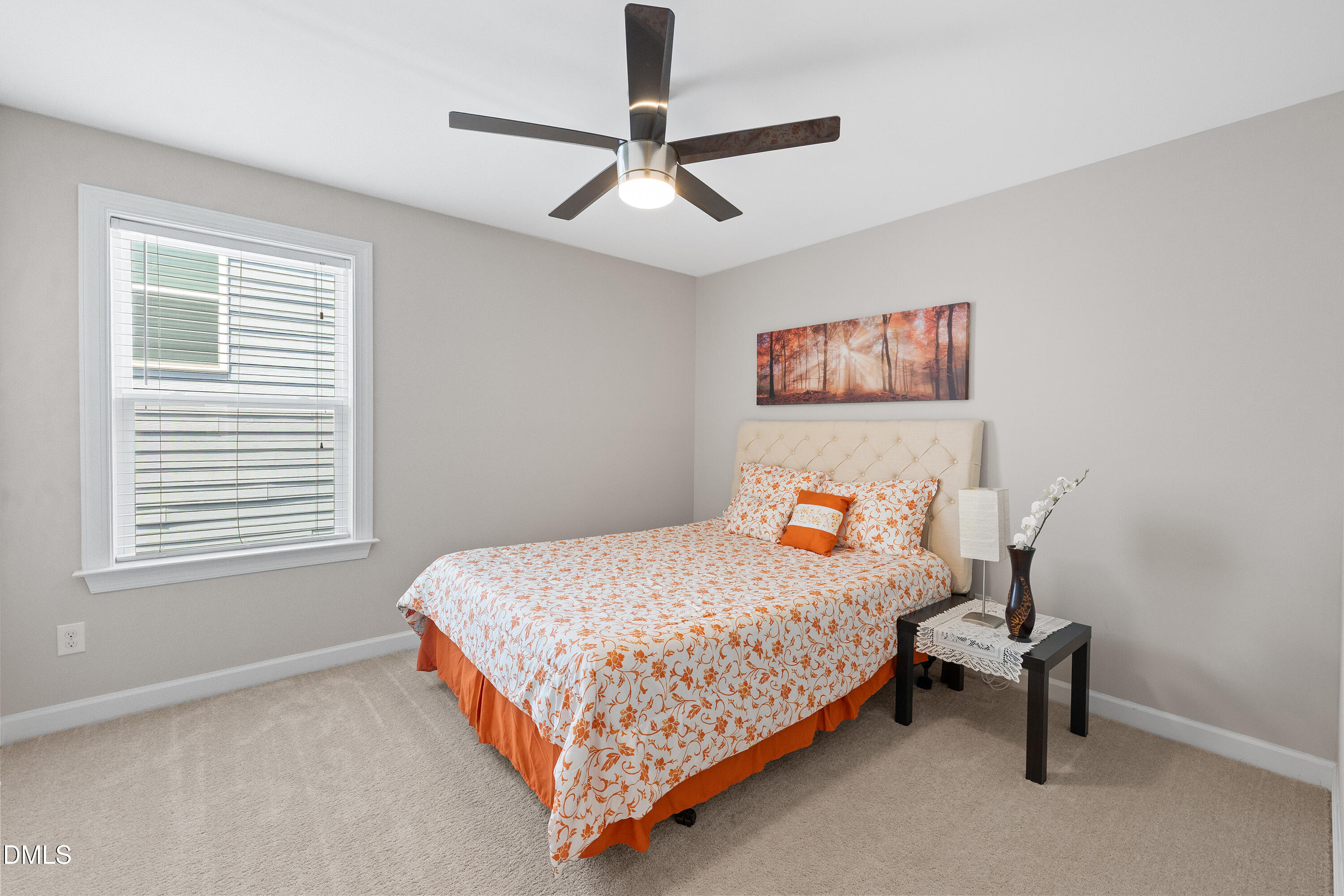8059 Gilano Drive Raleigh, NC 27603 - Photo 36 of 43 a bedroom with bed and a window