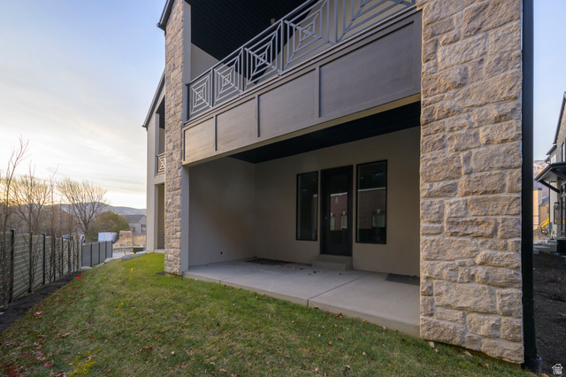 250 South Main Street, Unit 9 Alpine, UT 84004 - Photo 5 of 34 Back of house featuring stone siding, a patio, and stucco siding
