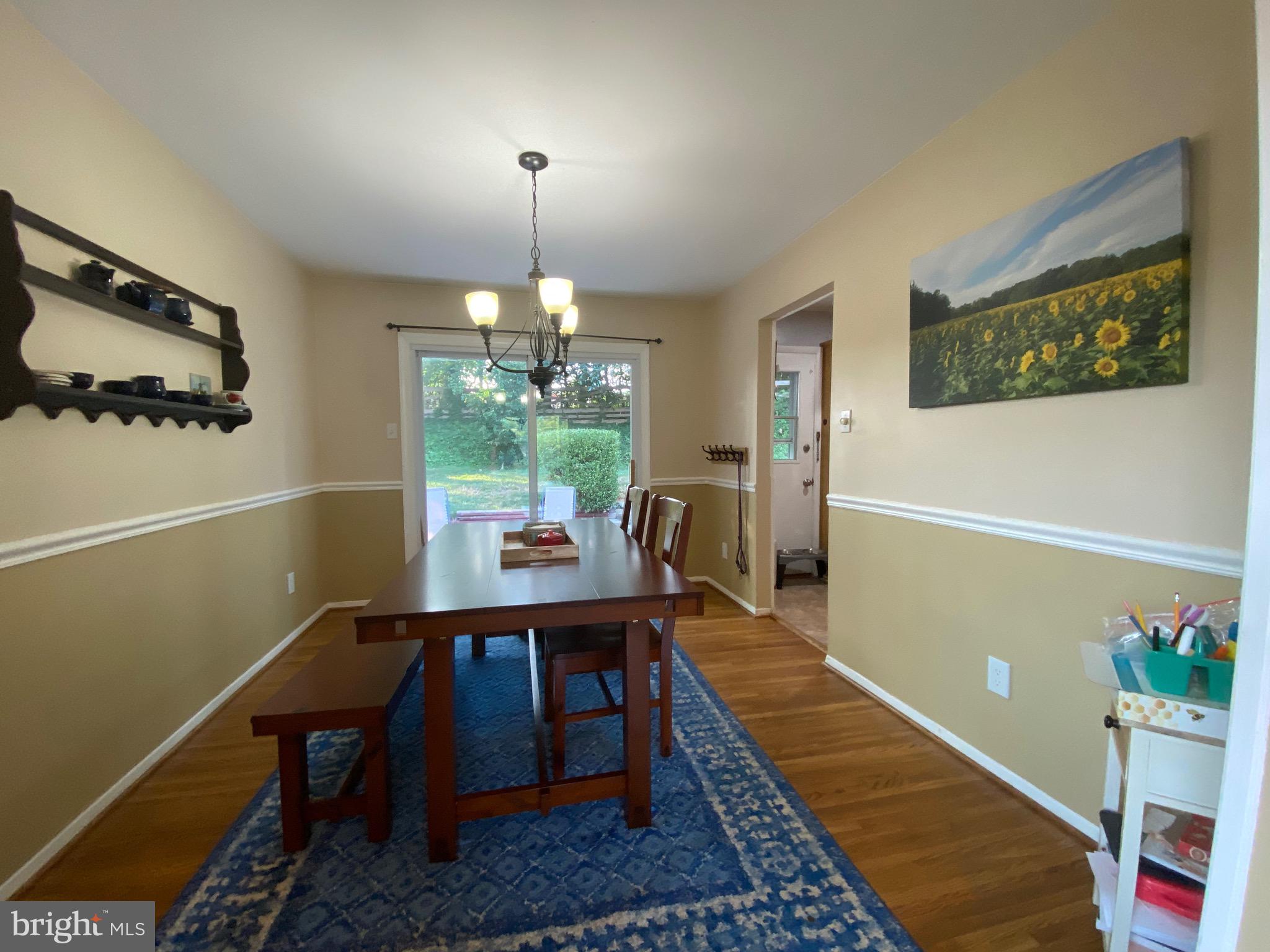 8614 Arley Drive Springfield, VA 22152 - Photo 8 of 24 a view of a dining room with furniture window and wooden floor