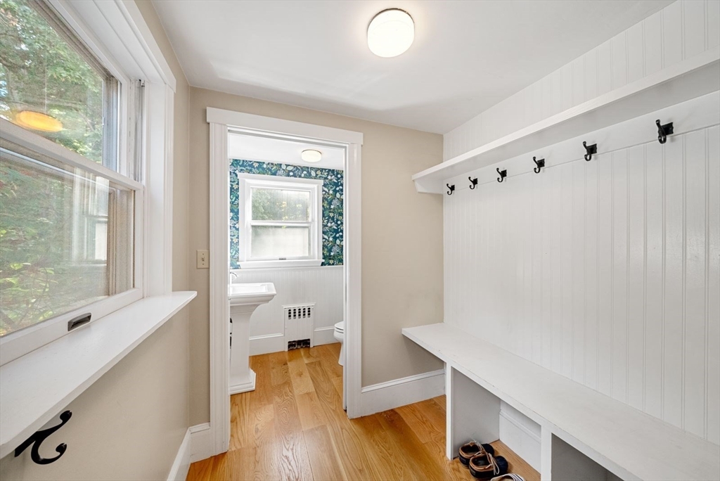 48 Golden Ball Road Weston, MA 02493 - Photo 13 of 21 a view of an empty room with wooden floor and a window