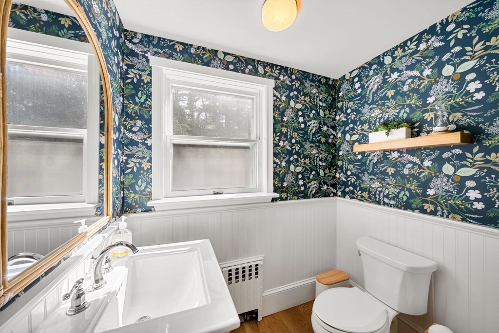 48 Golden Ball Road Weston, MA 02493 - Photo 14 of 21 a bathroom with a sink mirror vanity and toilet