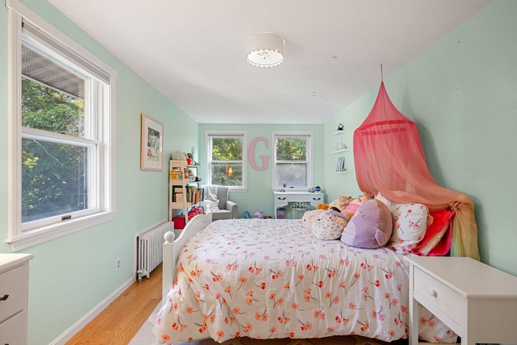 48 Golden Ball Road Weston, MA 02493 - Photo 16 of 21 a bedroom with a bed and a window