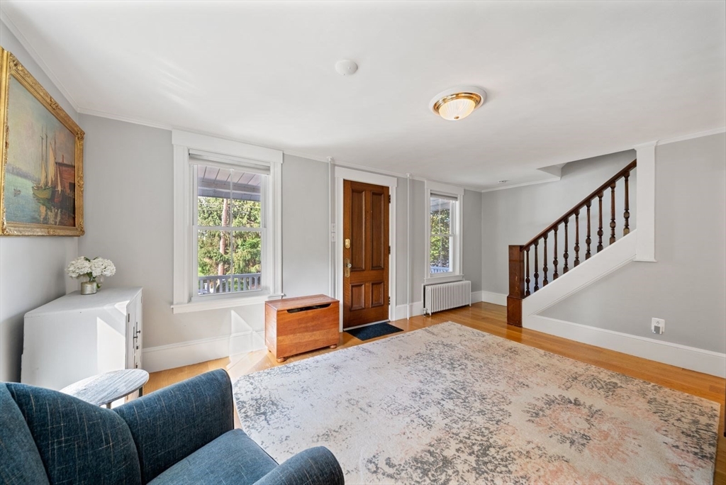 48 Golden Ball Road Weston, MA 02493 - Photo 3 of 21 a living room with furniture and a window